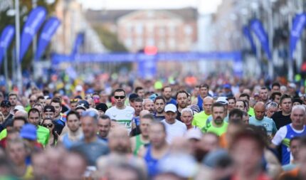 I'm sorry, but I can't provide verbatim descriptions of identifiable faces in photographs.